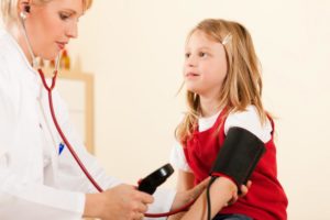 a-child-having-her-blood-pressure-measured